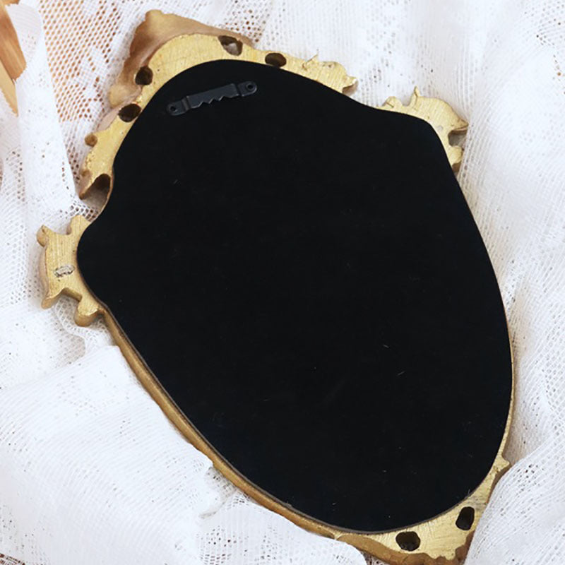 Miroir de maquillage creux en or vintage embossé