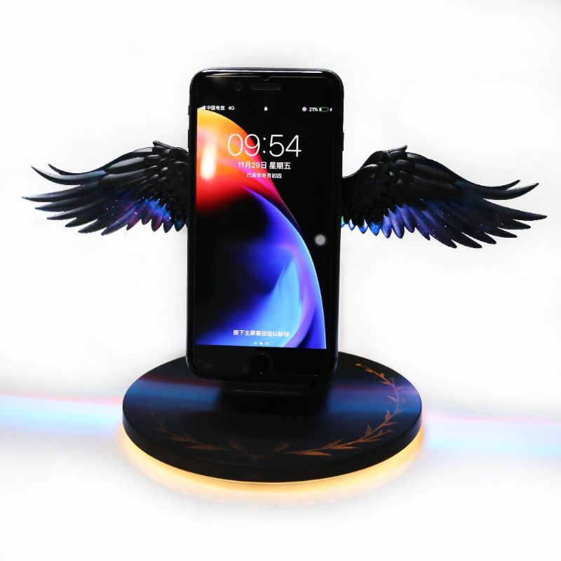 Chargeur sans fil avec ailes d’ange illuminées, design unique et élégant