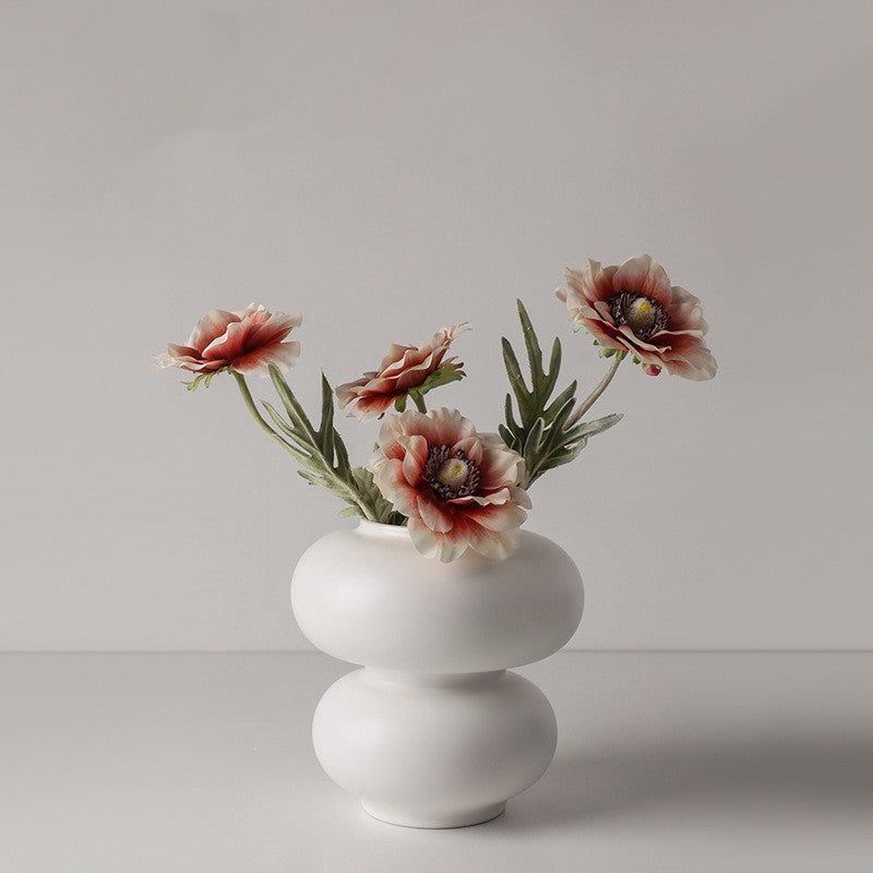 Vase en céramique blanc en forme de donut créatif