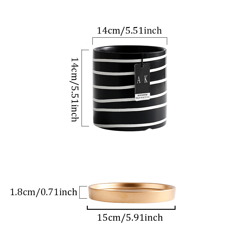 Pot de fleurs en céramique noir et blanc à motifs floraux