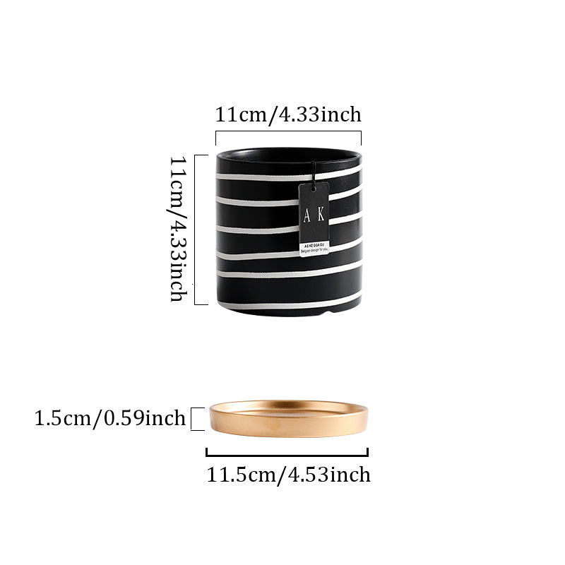 Pot de fleurs en céramique noir et blanc à motifs floraux