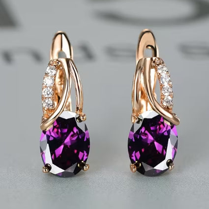 Boucles d'oreilles élégantes en cuivre et zircon violet, plaquées or 18 carats imitant la natation