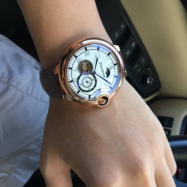 Montre mécanique en cuir véritable pour homme au style sport élégant et robuste