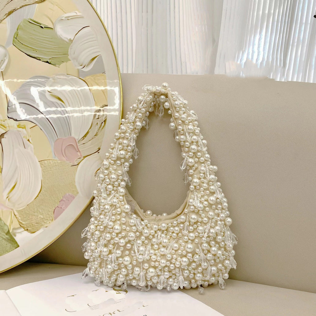 Sac d'épaule portatif au design minoritaire tendance, forme dumpling souple