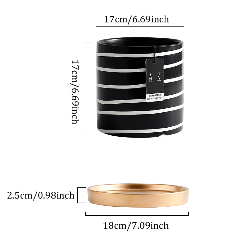 Pot de fleurs en céramique noir et blanc à motifs floraux