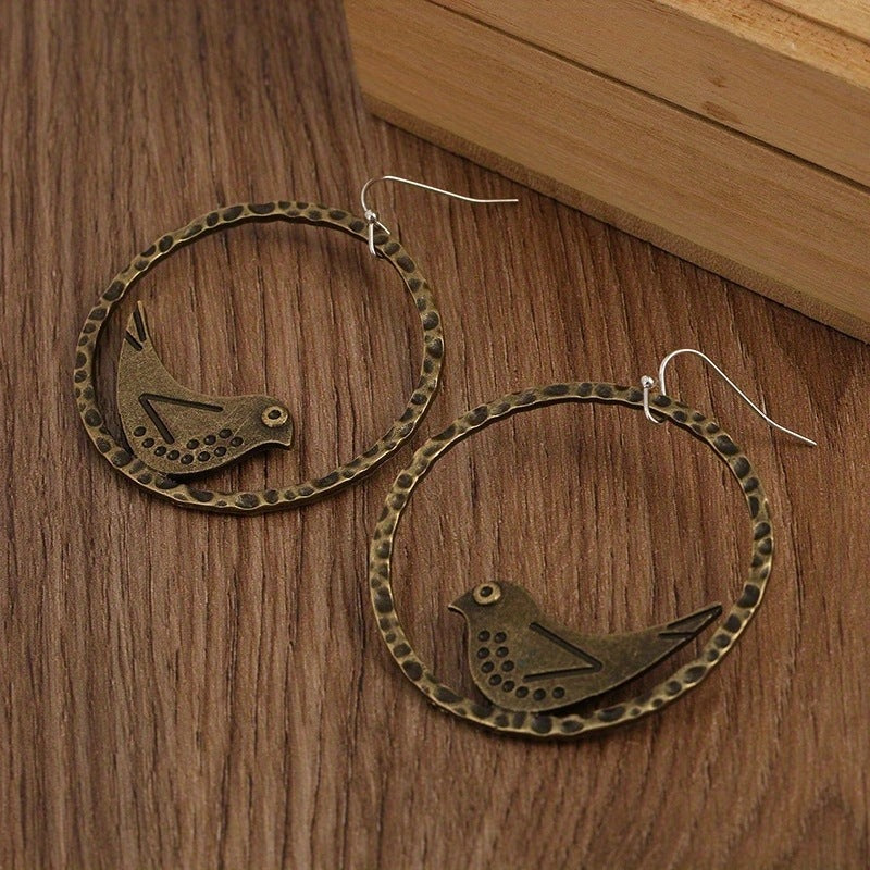 Boucles d'oreilles pendantes vintage de style bohème avec crochets en forme d'oiseau, design rond et creux
