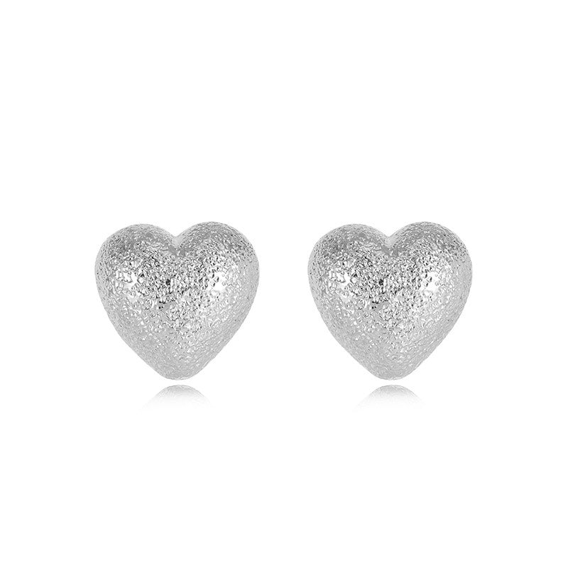Boucle d'oreille unique en argent sterling 999 texturée en forme de cœur, style élégant et doux, idéale pour une soirée romantique et sorties