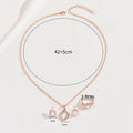 Bijoux femme Europe-Amérique: collier zirconia, anneau plat, boucles assorties et - IVOIRART.COM