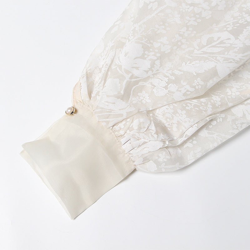 Blouse en organza à manches bouffantes style évêque, ceinture nouée, broderie florale raffinée - IVOIRART.COM