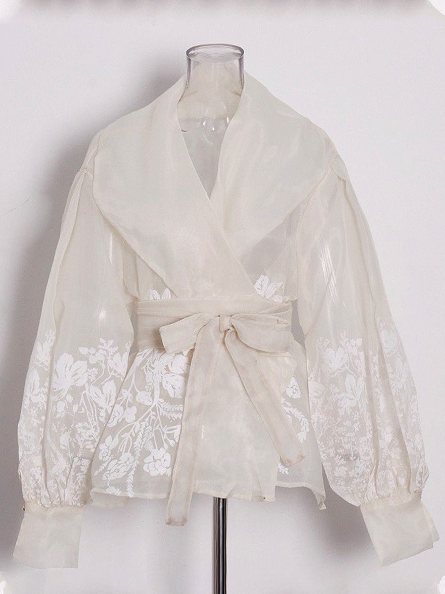 Blouse en organza à manches bouffantes style évêque, ceinture nouée, broderie florale raffinée - IVOIRART.COM