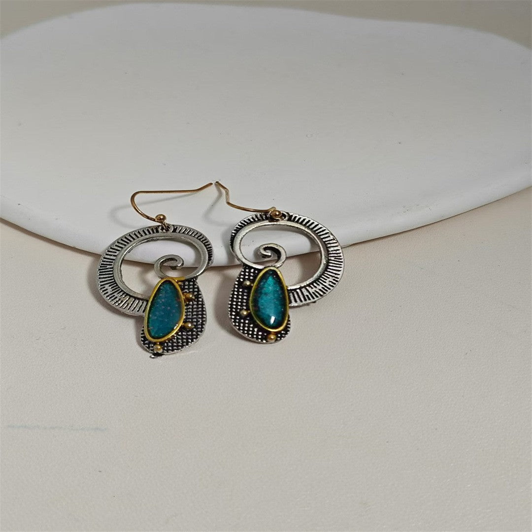 Boucles d’oreilles créatives en saphir à incrustation spirale avec accents jaunes éclatants - IVOIRART.COM