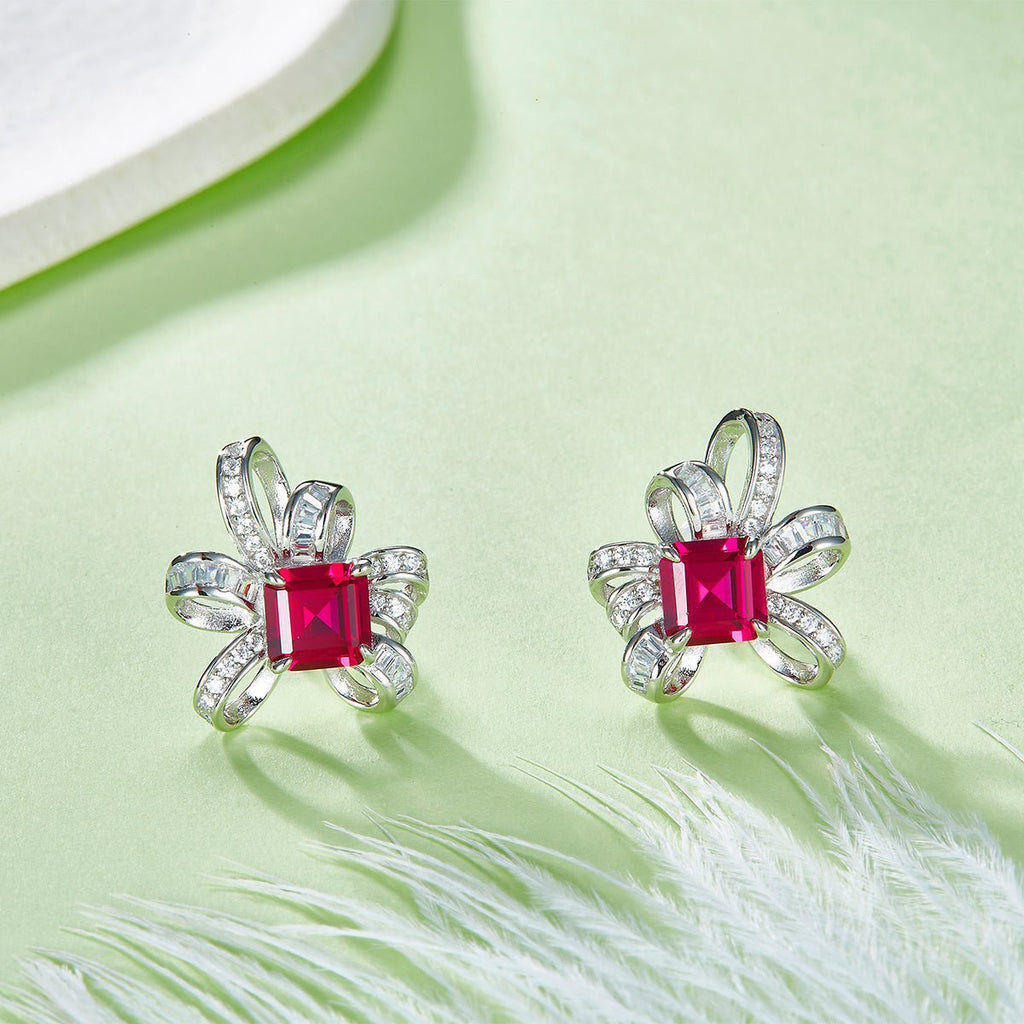 Boucles d'oreilles nœud S925 argent Rubis/Émeraude 6x6mm plaqué platine 3.2g co. - IVOIRART.COM