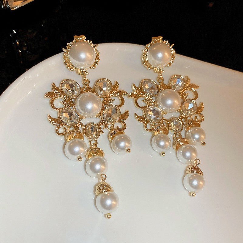 Boucles d'oreilles pendantes florales géométriques rétro, aiguille argentée - IVOIRART.COM