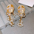 Boucles d'oreilles pendantes florales géométriques rétro, aiguille argentée - IVOIRART.COM
