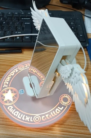 Chargeur sans fil avec ailes d’ange illuminées, design unique et élégant - IVOIRART.COM