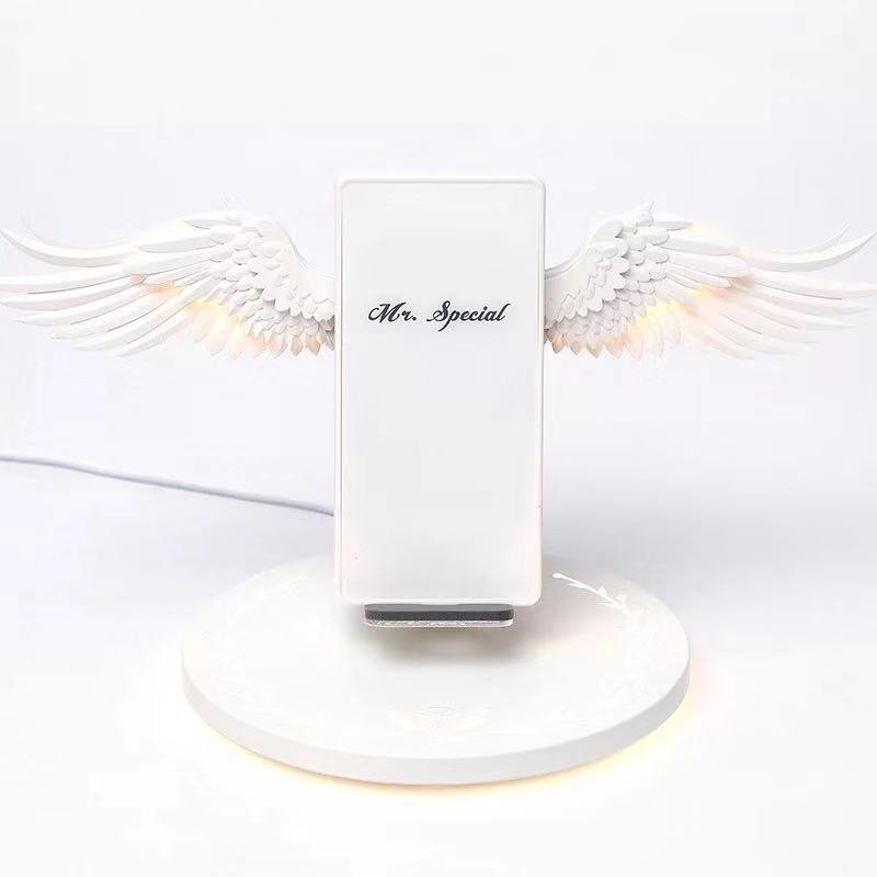 Chargeur sans fil avec ailes d’ange illuminées, design unique et élégant - IVOIRART.COM