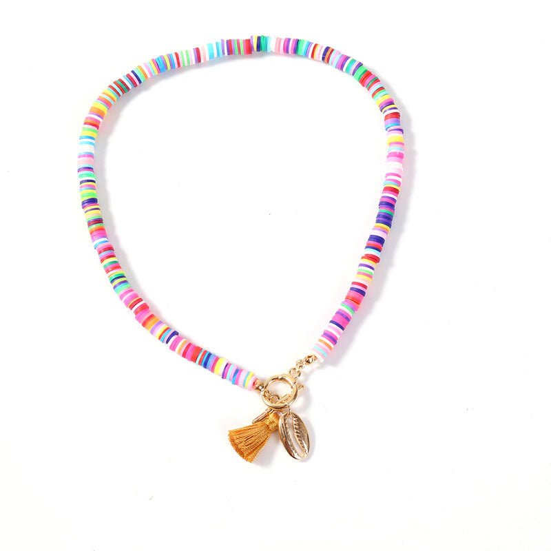 Collier Bohème Femme Coquillage avec Pompon Style Sauvage et Doux en 40 cm - IVOIRART.COM