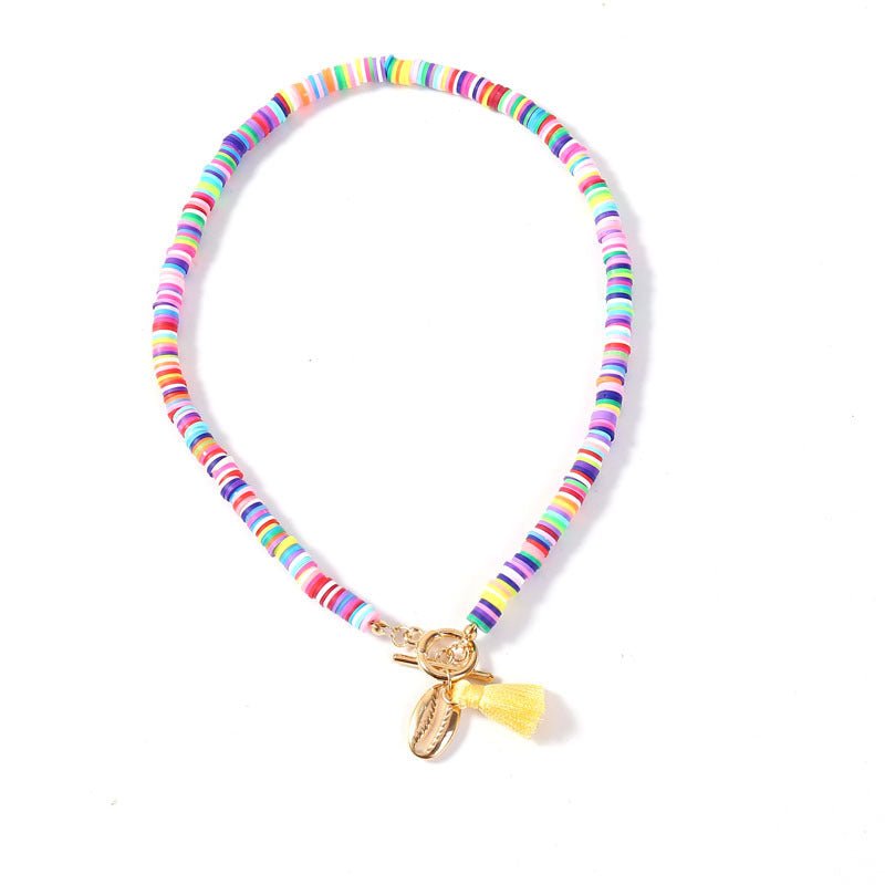 Collier Bohème Femme Coquillage avec Pompon Style Sauvage et Doux en 40 cm - IVOIRART.COM