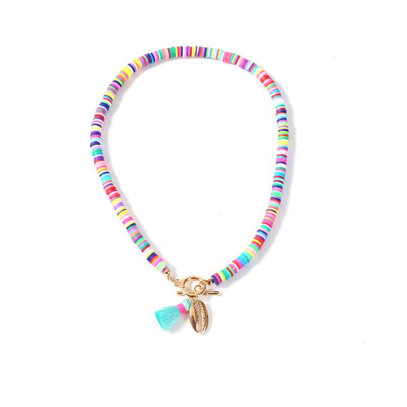 Collier Bohème Femme Coquillage avec Pompon Style Sauvage et Doux en 40 cm - IVOIRART.COM