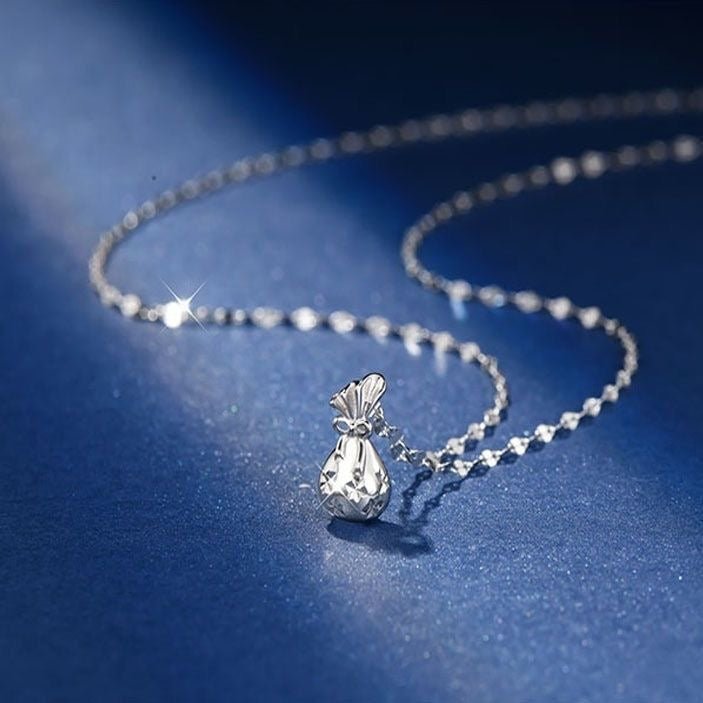 Collier Sac d’Argent Chanceux Creux en Argent 999, Élégant et Délicat, Parfait Cadeau d’Anniversaire - IVOIRART.COM