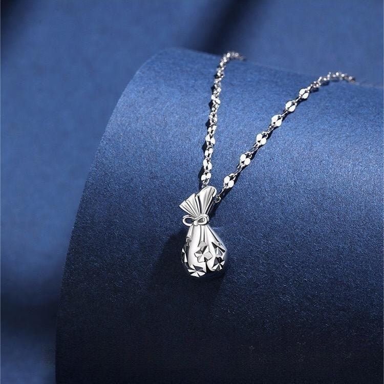 Collier Sac d’Argent Chanceux Creux en Argent 999, Élégant et Délicat, Parfait Cadeau d’Anniversaire - IVOIRART.COM