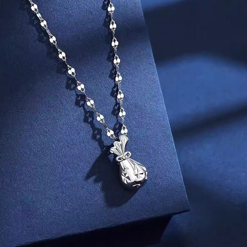 Collier Sac d’Argent Chanceux Creux en Argent 999, Élégant et Délicat, Parfait Cadeau d’Anniversaire - IVOIRART.COM