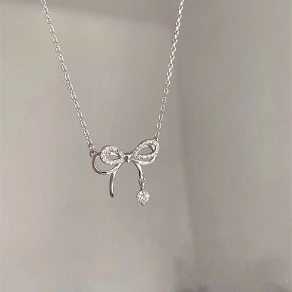 Collier Unique en Argent 999 Noeud Papillon & Zirconia, Élégant et Tendance, Cadeau Idéal Anniversaire et Saint - Valentin - IVOIRART.COM