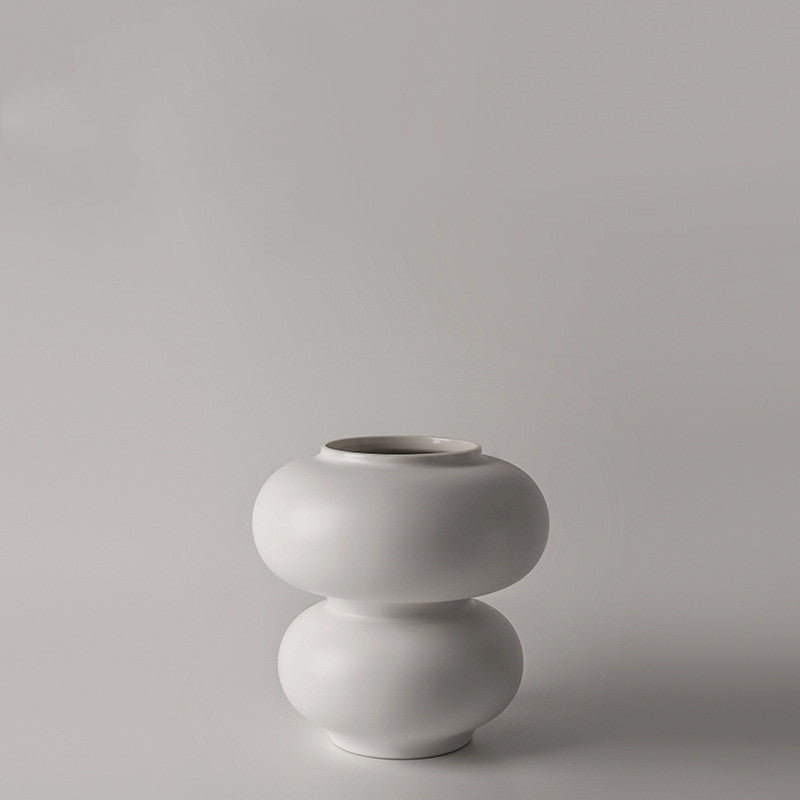 Vase en céramique blanc en forme de donut créatif