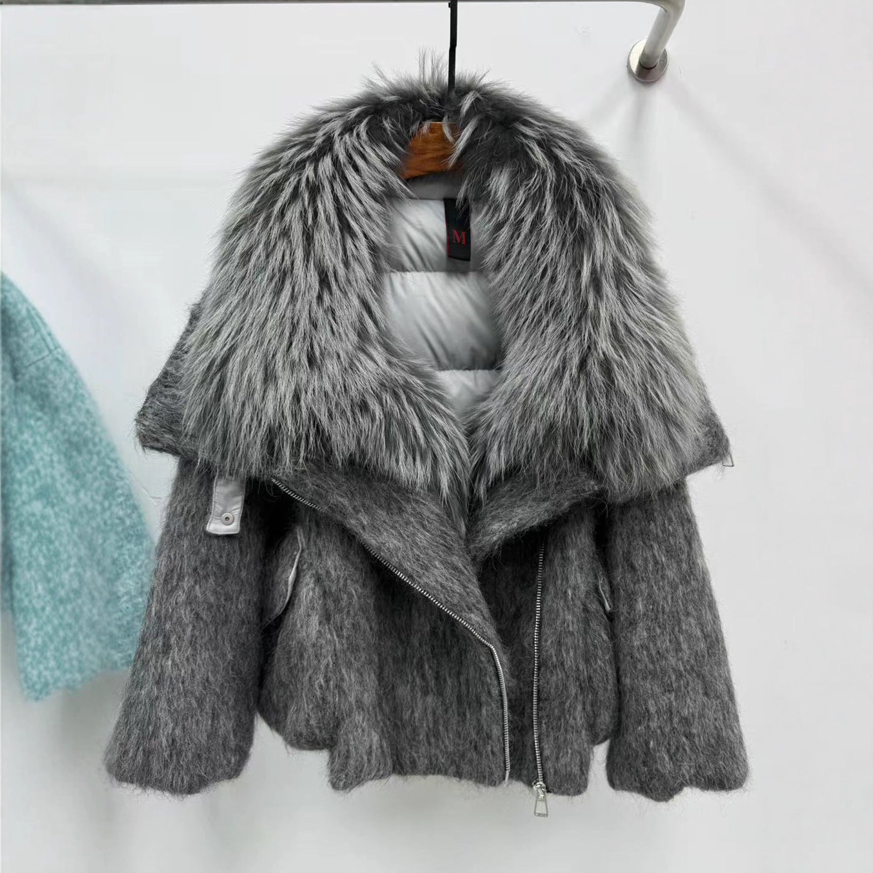 Doudoune femme avec luxueuse fourrure de cachemire et col en raton laveur pur - IVOIRART.COM