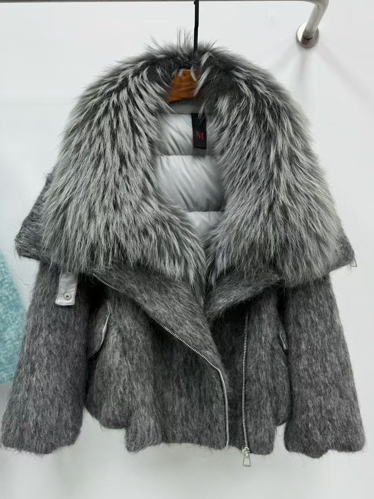 Doudoune femme avec luxueuse fourrure de cachemire et col en raton laveur pur - IVOIRART.COM