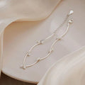 Bracelet de cheville ajustable en argent sterling 999 avec perle tubulaire ondulée, style minimaliste élégant pour l'été et cadeaux romantiques féminins