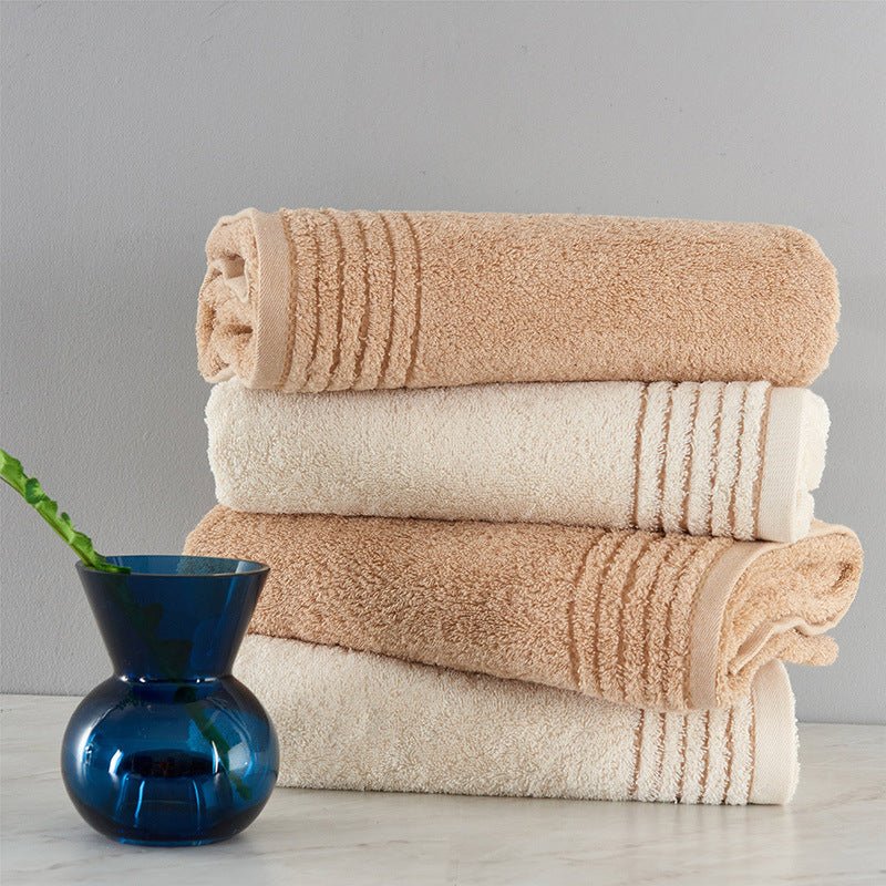 Ensemble de serviettes en coton doux beige et marron, tailles variées pour confort optimal - IVOIRART.COM