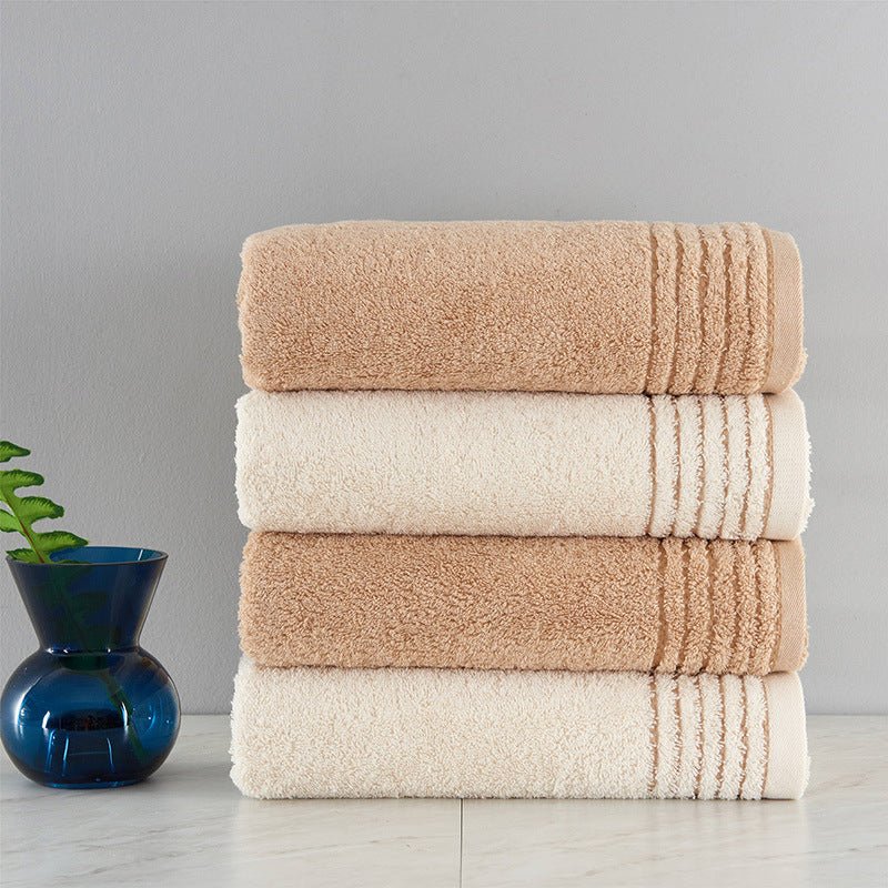 Ensemble de serviettes en coton doux beige et marron, tailles variées pour confort optimal - IVOIRART.COM