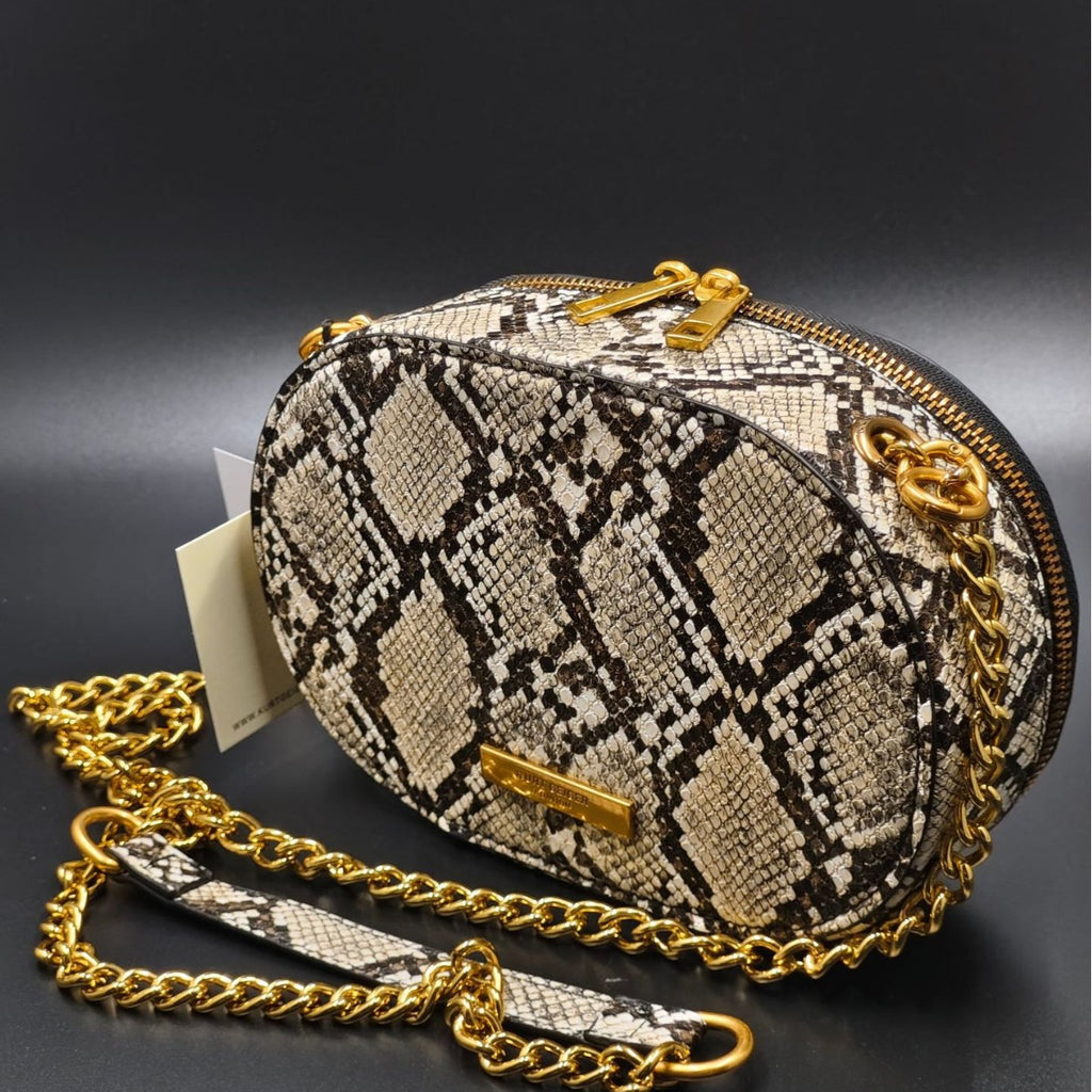Petit sac design de niche à bandoulière et en travers 21x14x7 cm cuir synthétique