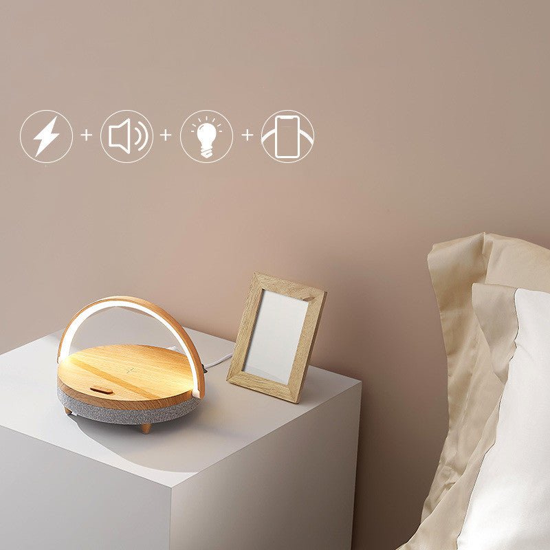 Lampe de Nuit LED avec Chargeur Sans Fil et Enceinte Bluetooth Intégrée - IVOIRART.COM