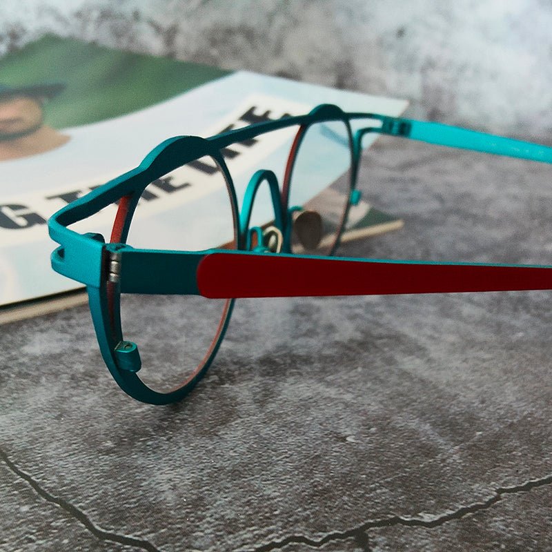Lunettes de soleil rétro femme en titane pur, monture complète, contraste rouge - vert - IVOIRART.COM