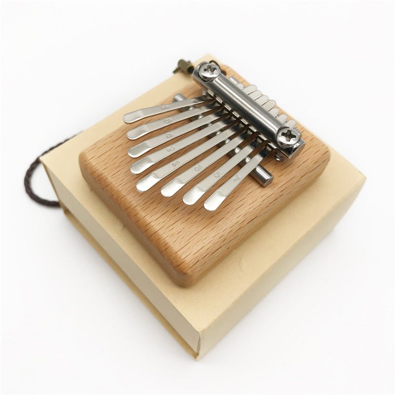 Petit piano à pouces mini 8 notes pour moments musicaux authentiques et portables - IVOIRART.COM