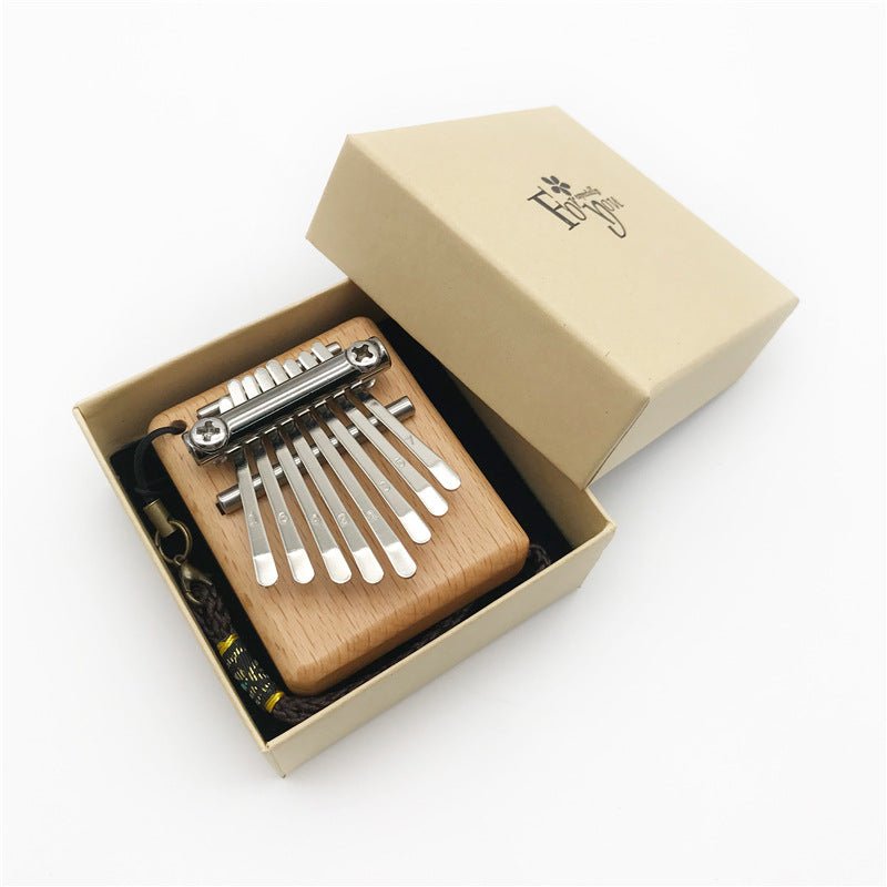 Petit piano à pouces mini 8 notes pour moments musicaux authentiques et portables - IVOIRART.COM
