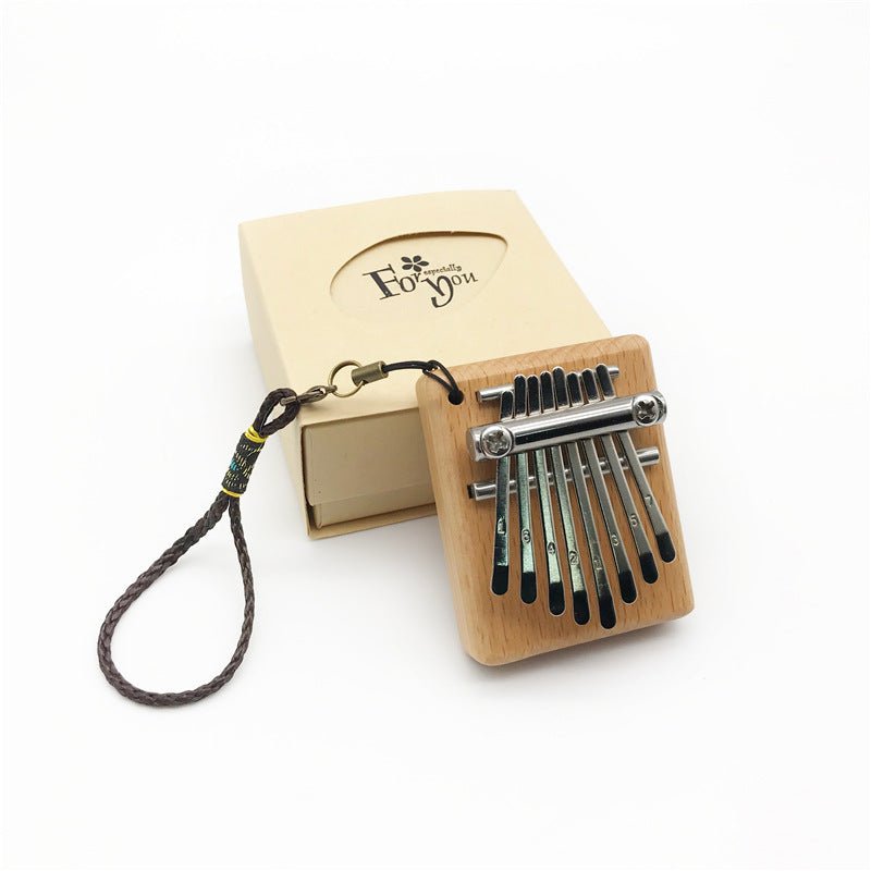 Petit piano à pouces mini 8 notes pour moments musicaux authentiques et portables - IVOIRART.COM