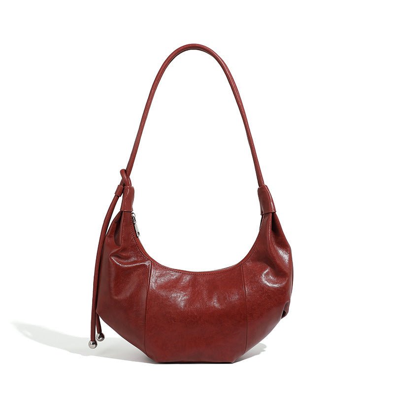 Sac bandoulière en cuir véritable, style croissant, porté épaule et sous bras - IVOIRART.COM