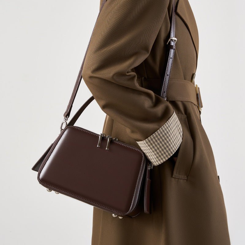 Sac bandoulière série Hanging Ear, design spécial, cuir véritable, format commute - IVOIRART.COM