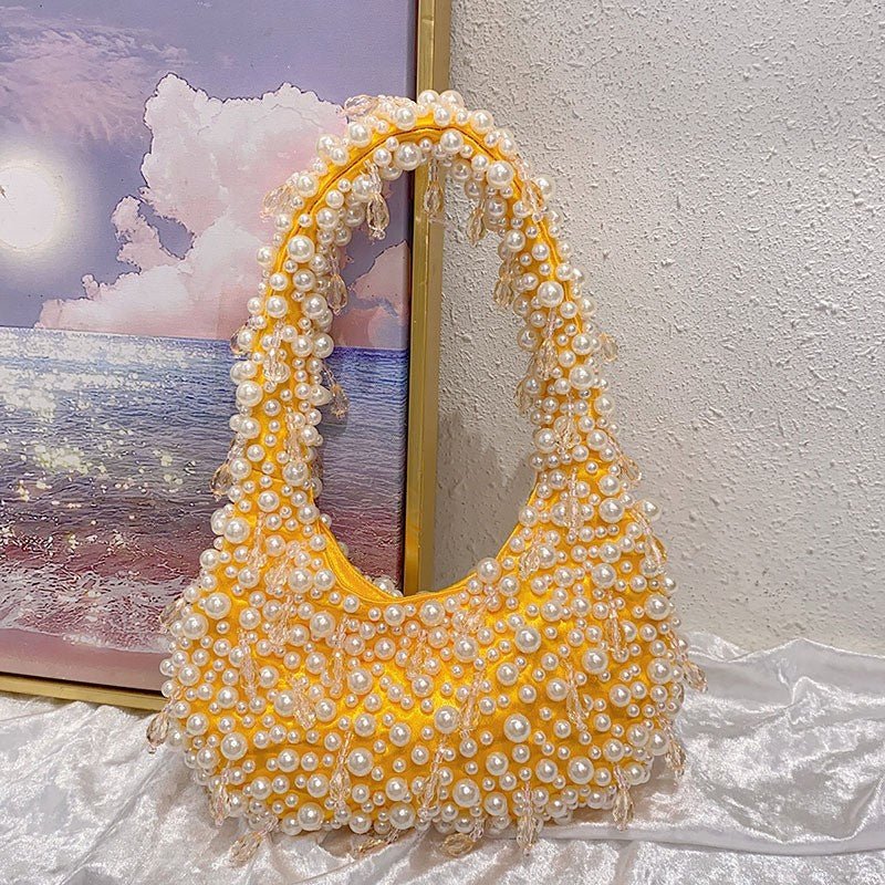 Sac d'épaule portatif au design minoritaire tendance, forme dumpling souple - IVOIRART.COM