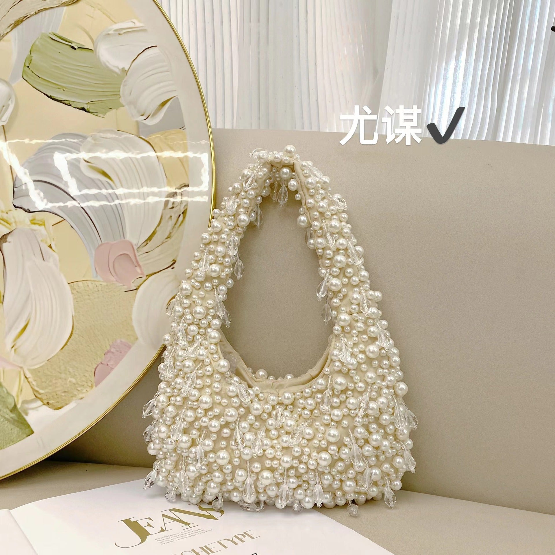 Sac d'épaule portatif au design minoritaire tendance, forme dumpling souple - IVOIRART.COM